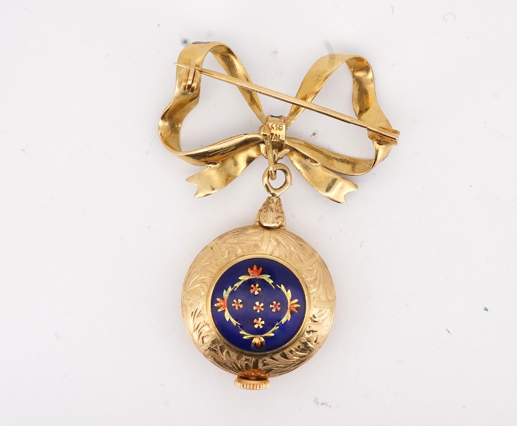A mid 20th century Italian 18k and enamel fob watch, dial a.f., suspended from and Italian 18k and blue enamelled ribbon bow brooch, brooch width 30mm.